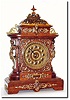 C.1894, Ansonia Clock Co., "Cabinet E', in antique oak with brass trimmings.