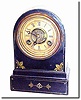 C.1868, Terry Clock Co., Waterbury, Con, smallest round gothic cast iron time and alarm shelf clock in excellent original condition.