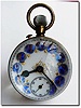C.1900, French, Paperweight Clock, with white enamel dial with gold numerals on blue shields.