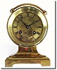 C.1890, French, Ship"s Bell clock, in a brass case, on a convertible brass base suitable for desk or wall mount.