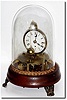C.1875, Another Welch version of the Briggs rotary timepiece, with original glass dome.