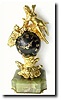 C.1870, French, in the style of Louis XIV, a miniature ormolu and bronze figural clock