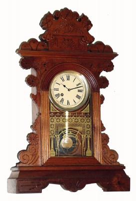 C.1975, Jim Davis, Greensboro, NC, miniature gingerbread clock, walnut cased, with 30 hour fit up movement. — Antique Clocks Price Guide