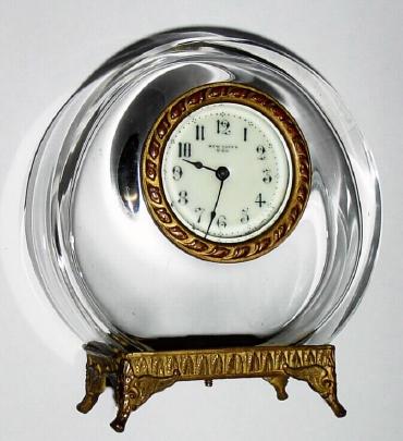 C.1910, New Haven Clock Co., small crystal clock in a nicely molded round glass case, 30 hour. — Antique Clocks Price Guide