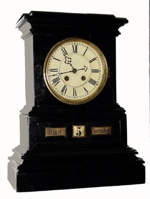 C.1890, German, Multi Dial calendar clock, the lower dial with apertures for the day, month and date. The day and month are on paper rollers and the date is on a cloth ribbon that rolls from a large spool to a smaller one. — Antique Clocks Price Guide