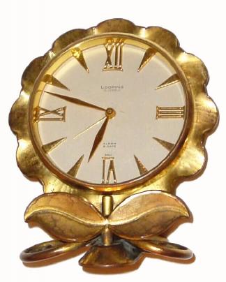 C.1950, Swiss, Looping, 8-day 15 jewel movement alarm timepiece, in the form of a flower on stem. — Antique Clocks Price Guide