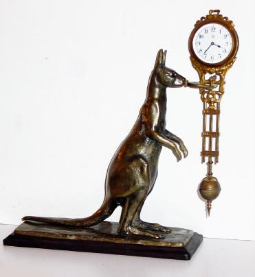 Mixed lot: C.1910, Junghans 8-day swinging arm movement, now on a C.2000 Chinese cast bronze repro kangaroo statue. — Antique Clocks Price Guide