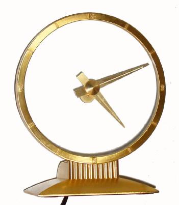 C.1955 Jefferson Electric Co., Bellwood, IL, "Jefferson Golden Hour" mystery timepiece. — Antique Clocks Price Guide