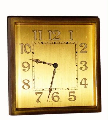 C.1950 Swiss, gilt brass case, 8-day jeweled movement travel or desk timepiece. — Antique Clocks Price Guide