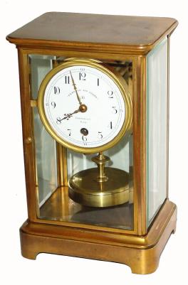 C.1915, French, Grivolas, "Pendule 400 Jours" in a brass and glass 4 glass case, serial number 3184-0, with matching number on disc pendulum. — Antique Clocks Price Guide