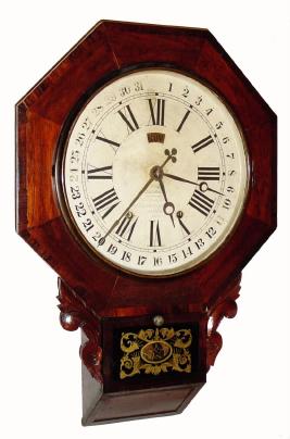 C.1870, Ansonia Brass and Copper Co., chisel bottom mahogany with rosewood banding, school clock with Terry patent calendar. — Antique Clocks Price Guide