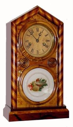 C.1880, Ingraham "Candy Stripe" DORIC, with alternating maple and walnut veneers, 30 hour time and strike. — Antique Clocks Price Guide