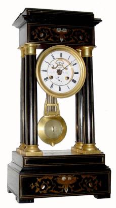 C.1860, French, Gre. Pinet, Paris, Empire 4-column mantel clock, with calendar and open escapement on the porcelain dial. — Antique Clocks Price Guide