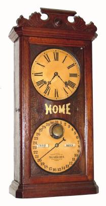 C.1880, Ithaca HOME double dial calendar clock in walnut. — Antique Clocks Price Guide