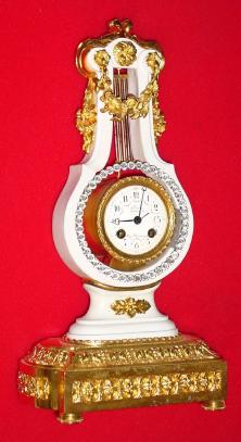 C.1910, French, Leroy, Horoger du Roy, Paris, lyre form mantel clock with swinging brilliants, 8-day time and strike. — Antique Clocks Price Guide
