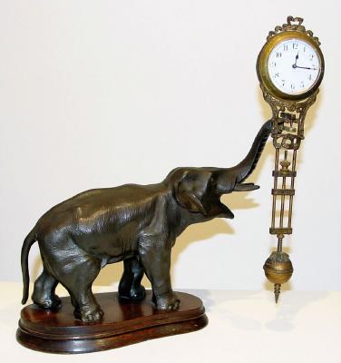 C.1905, German, Junghans, ELEPHANT, 8-day, swinging arm timepiece. — Antique Clocks Price Guide