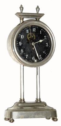 C.1921, English GRAVITY clock, the clock driven by its own weight, and raised each day along a ratcheted upright, and with exposed escapement and compound bar-bell pendulum. — Antique Clocks Price Guide