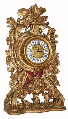Mixed lot: C.1800, French, Gilt Wood carved case with cast dial, now with a C.1900, gong striking movement. — Antique Clocks Price Guide