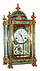 C.1998, Chinese, Crystal Regulator, with porcelain enamel decorations, and portrait panels either side. 