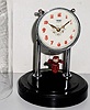 C.1950, Japan, Swinging Doll clock, 30 hour, under replacement dome. 