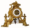 C.1900, French, swinging doll timepiece, 8-day, in a gilt figural case/LESS base. 