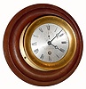 C.1911 (dated), Chelsea timepiece, won by the "Gilt Edge" in cat boat races in July 1911, 4.5 inch dial, mounted on a turned walnut base for wall hanging. 