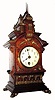 C.1890, German, Lenzkirch, walnut mantle clock with 34 +/- pieces of polished bronze trim. 