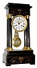 C.1860, French, Gre. Pinet, Paris, Empire 4-column mantel clock, with calendar and open escapement on the porcelain dial. 