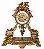 C.1890, French, Swinging Doll clock, in a gilt spelter case, 8-day striking. 
