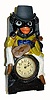 C.1910, German, Moving Eye Minstrel clock. They made these clocks with frogs and other performers, however this particular one is a black minstrel, complete with his fiddle, and booze bottle in his right hand.