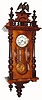 C.1900, German, Wall Regulator quarter hour strike, with Hour Glass type door and fancy embossed pendulum. 