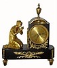C.1830, French, Bronze and Ormolu figural mantel clock, a lady kneeling and praying. 