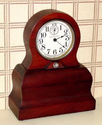 C.1920, F. W. Jansen Clock Co, Chicago, IL, NITELITE, electric alarm, mahogany case. — Antique Clocks Price Guide