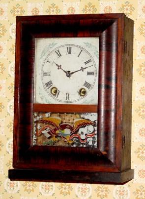C.1870, Terry Clock Co., Waterbury, Conn., 30-hour time/strike reverse OG cottage clock. — Antique Clocks Price Guide
