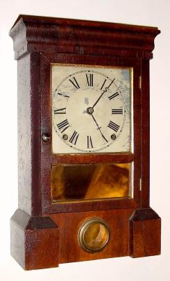 C.1863, Seth Thomas "O.G. Cornice", 8-Day mantel clock in rosewood with original orange peel finish and some minor veneer chips. — Antique Clocks Price Guide