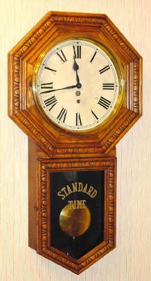 C.1911, New Haven, BANK, embossed oak long drop octagon regulator, time only. — Antique Clocks Price Guide