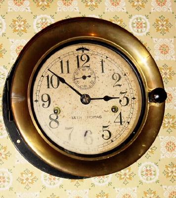 C.1941, Seth Thomas, Naval Deck clock, double spring time, 8-day in black bakelite case with brass veneer bezel. — Antique Clocks Price Guide