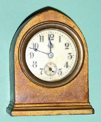 C.1920, Jennings Bros, Bridgeport, Conn, mini cast spelter desk clock with porcelain dial. — Antique Clocks Price Guide