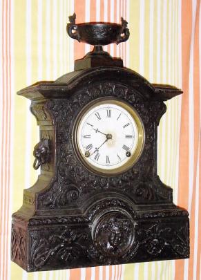 C.1860, William L. Gilbert Clock Co., 8-day time/strike cast case mantel clock. — Antique Clocks Price Guide