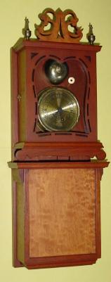 C.2002, Michael Paul, Berea, OH, Mini Repro Grafton Wall Clock, Willard Model, the case of solid mahogany, single weight, 30 hour time. — Antique Clocks Price Guide