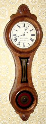 C.2000, Wayne R. Cline, Bowling Green, KY, mini No. 9 regulator (figure 8), in walnut, with 8-day lever movement. — Antique Clocks Price Guide