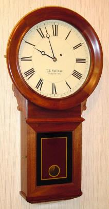 C.1994 (dated inside), T. J. Sullivan, Strongsville, OH, reproduction No. 70 regulator, in walnut. — Antique Clocks Price Guide