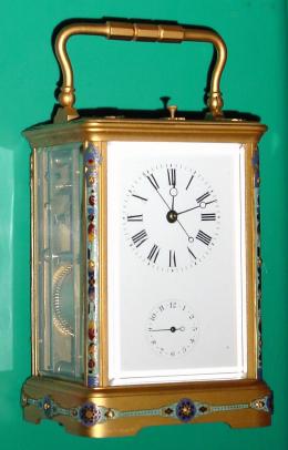 C.1910, French for the Japanese market, brass cased carriage clock, time, strike, repeat and alarm with center seconds hand. — Antique Clocks Price Guide