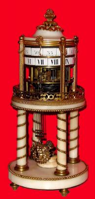C.1800. French, Annular Dial Clock, Ormolu and Marble, horizontal revolving porcelain chapter rings, the bell striking movement with anchor escapement, now with suspension spring. — Antique Clocks Price Guide