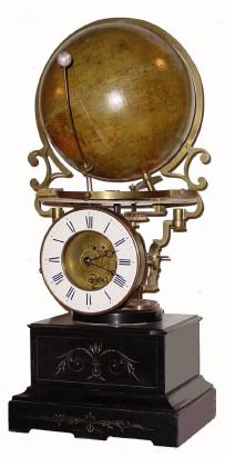 C.1870, French, Rare Annual Calendar and Terrestrial globe timepiece, 5.5" porcelain chapter ring, the spring driven movement driving the 9.5" Delamarche globe above a painted annual calendar, the whole setting on a black marble case. — Antique Clocks Price Guide