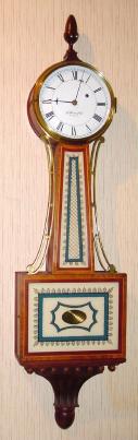 C.1981, E. Howard and Co., Boston, Model No. 95 Re-issue. 8-day, weight driven banjo clock, serial No. 14, mahogany cross-banded case. — Antique Clocks Price Guide