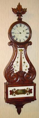 C.1830, Boston Area Lyre Banjo, now with a dial from the same period, with an original signature of Aaron Willard Jr., Boston, 2 extra holes in "head". — Antique Clocks Price Guide