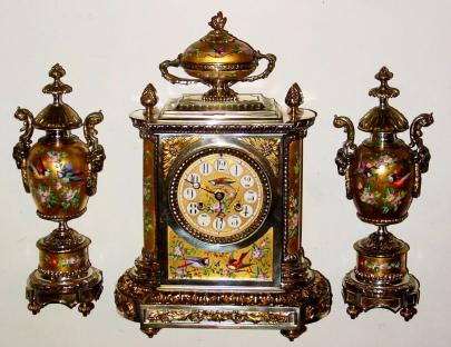 C.1890, French for Schneider and Co., Union Square, NY 3-piece mantel garniture, gilt brass and porcelain, with hand painted flowers and birds. — Antique Clocks Price Guide
