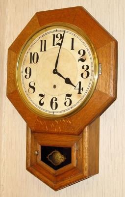 C.1920, New Haven Clock Co., 12 Inch Drop, in oak, 8-day time only. — Antique Clocks Price Guide