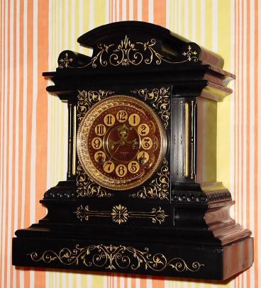 C.1883, Ansonia Clock Co., "Marbelite No. 8", 8-day time/strike hard rubber case mantel clock. — Antique Clocks Price Guide
